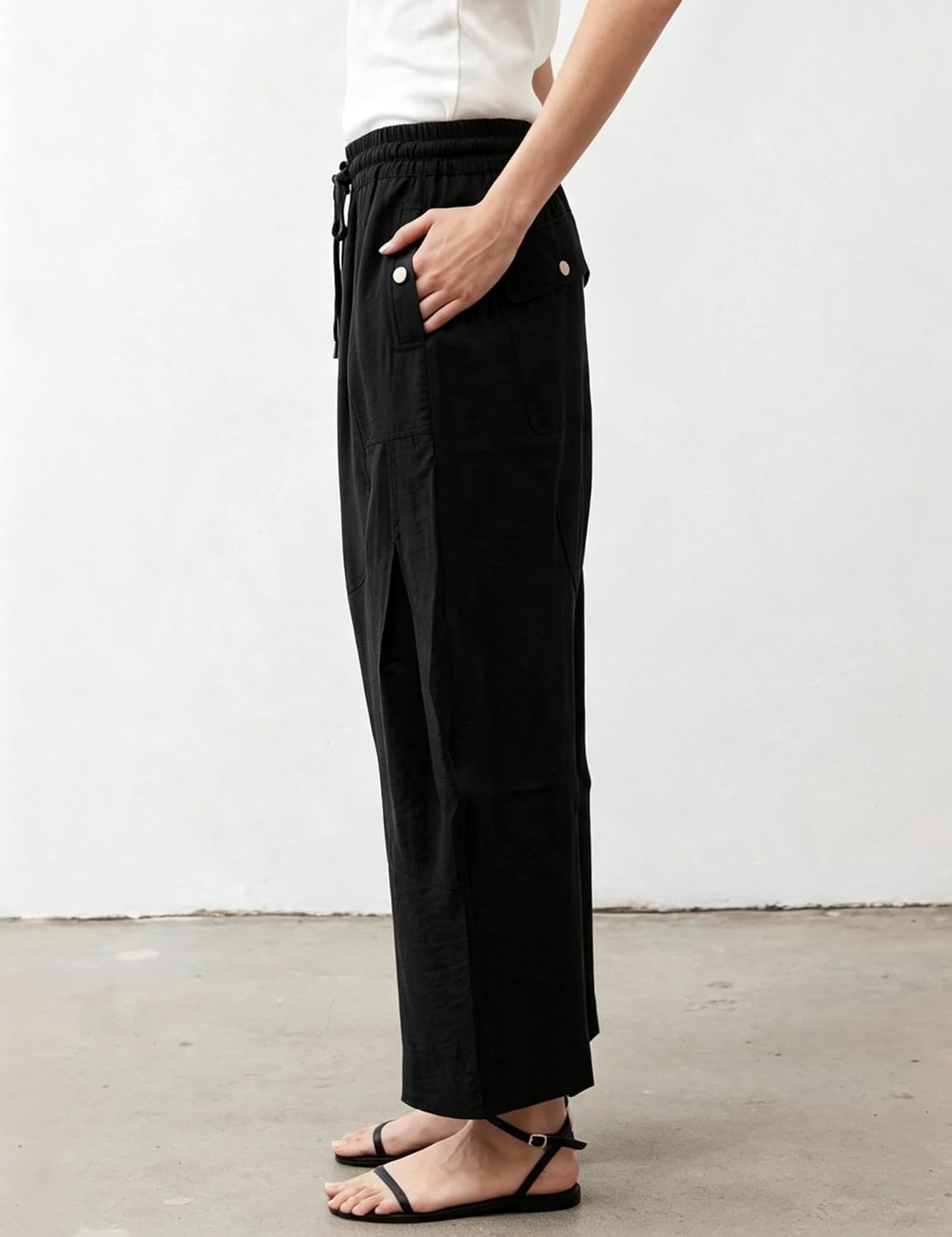 image:imageSpringrain Womens Barrel Cotton Linen Pants Drawstring Waist Lightweight Breathable Material Functional Button Pockets Wide Leg Pants for Women Packable for Travel MultiScene WearBlack