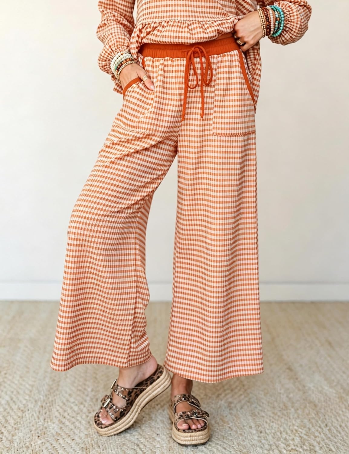 image:imageSpringrain Womens Gingham 2 Piece Outfits Wide Leg Lounge Set Peplum Ruffle Hem Side Pocket Wide Leg Pants Relaxed Balloon Long Sleeves Lightweight Fabric Drawstring Elastic WaistOrange